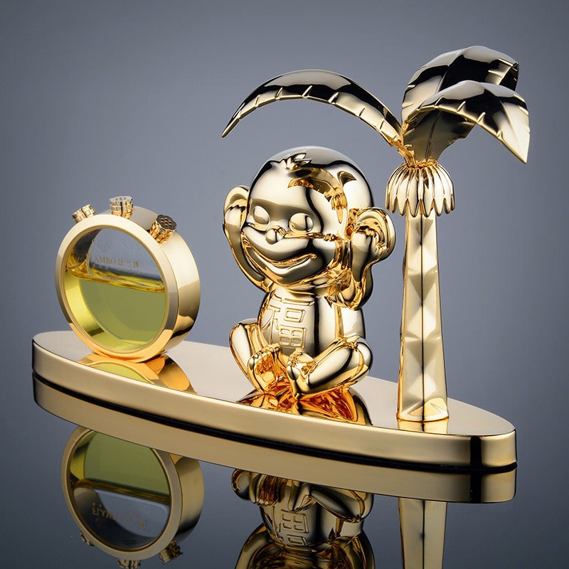 Tượng khỉ kết hợp nước hoa trang trí xe hơi