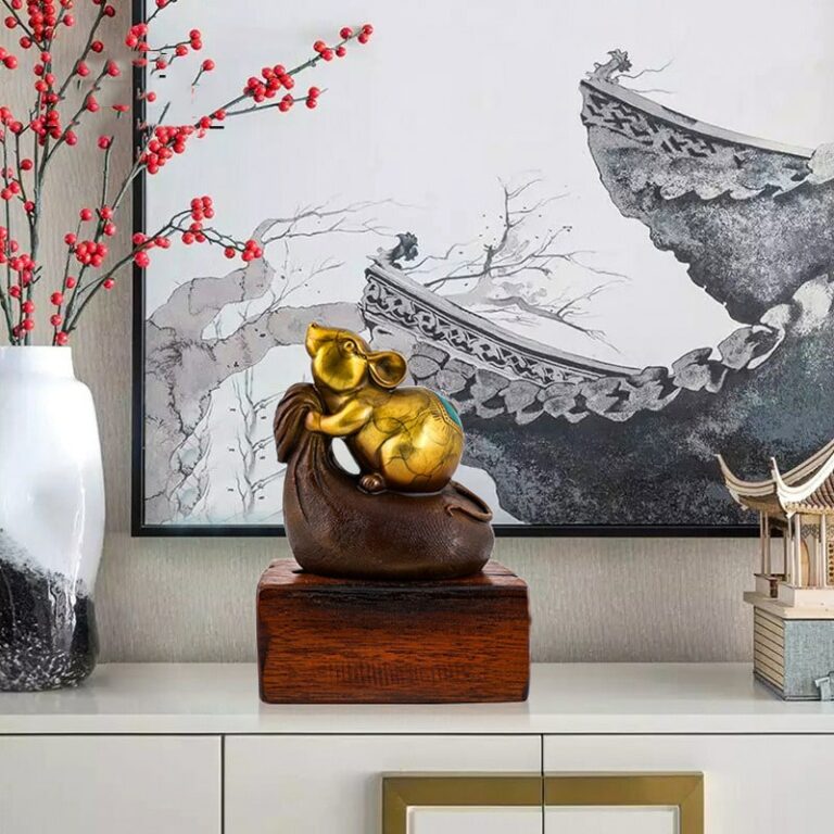 tuong-chuot-om-tui-tien- Tượng chuột ôm túi tiền chất liệu đồng