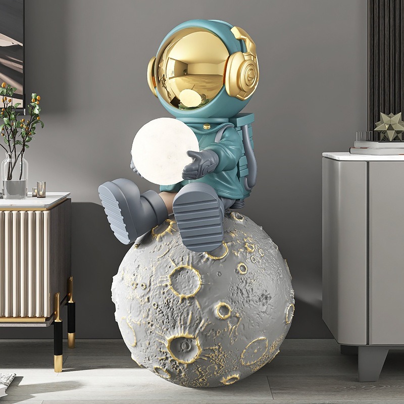 tuong-decor-phi-hanh-gia-ngoi-tren-mat-trang-de-san